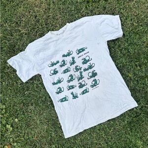 White T-Shirt with Green Graphic
